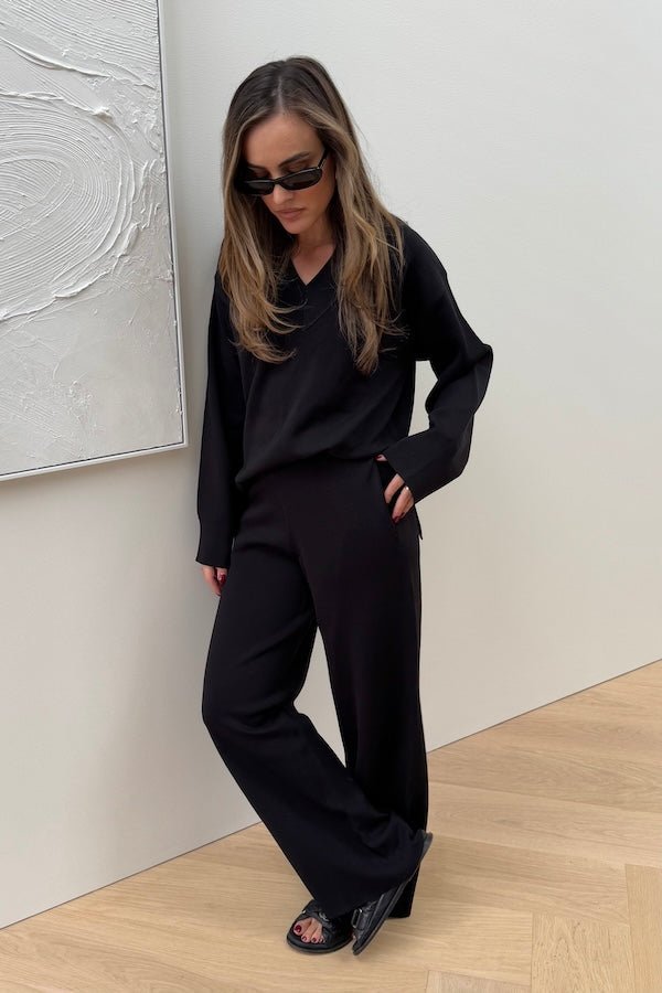 Sneaky Link Lilly Sweater in luxe viscose yarn, an oversized V-neck knit with ribbed trims, perfect for off-duty layering and comfort.