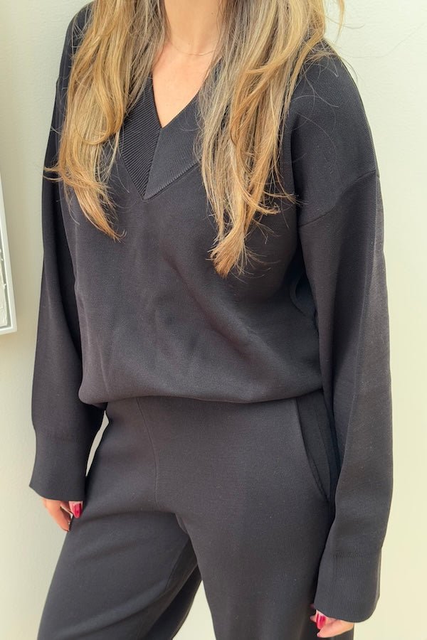 Sneaky Link Lilly Sweater in luxe viscose yarn, an oversized V-neck knit with ribbed trims, perfect for off-duty layering and comfort.