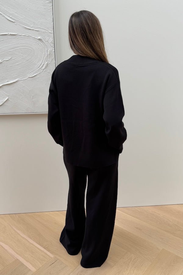 Sneaky Link Lilly Sweater in luxe viscose yarn, an oversized V-neck knit with ribbed trims, perfect for off-duty layering and comfort.