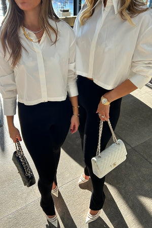 Exclusive Clements Pants by Camilla and Marc feature a slim, high-waisted fit crafted from a stretchy wool blend. Pintucks and press pleats elongate the legs, while tailored back welt pockets and darts ensure a structured silhouette.