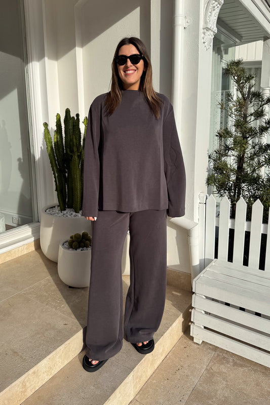 Elanora Long Sleeve Lounge Top Amethyst by Camilla and Marc – Soft high-neck lounge top with side splits, silicone monogram, and blind hems.