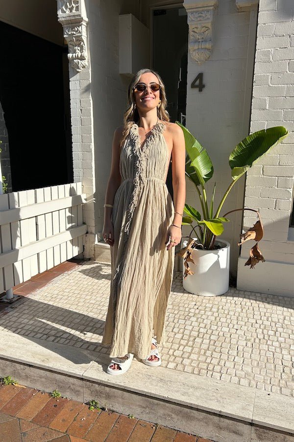 NEW Artemis Dress Sand by D'Artemide – Cotton halter dress with cutout, front split, cold hand wash, and delicate boho style.