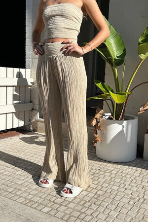 Lito Pants Sand by D’Artemide, versatile one-size cotton pants with elastic waist and straight leg, perfect for effortless boho style from day to night.