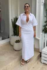 Lefka Midi Dress White by Sneaky Link – Breezy 100% linen midi with button-front and flattering tucks. Perfect for trendy summer strolls or viral lunch dates.