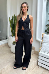 Luna Linen Pant Black by Sneaky Link, relaxed mid-waist 100% breathable linen pants with elasticated waistband and self-drawcord for customizable comfort, ideal for chic summer styling or casual days.