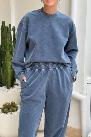 Dovell Crew Indigo by Camilla and Marc, denim fleece with saddle stitching and adjustable hem, perfect for casual days or trendy streetwear layering.