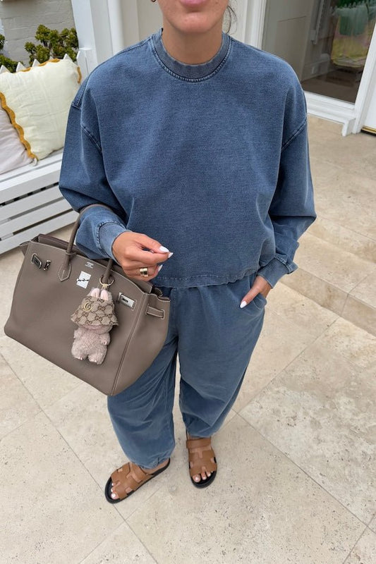 Dovell Crew Indigo by Camilla and Marc, denim fleece with saddle stitching and adjustable hem, perfect for casual days or trendy streetwear layering.