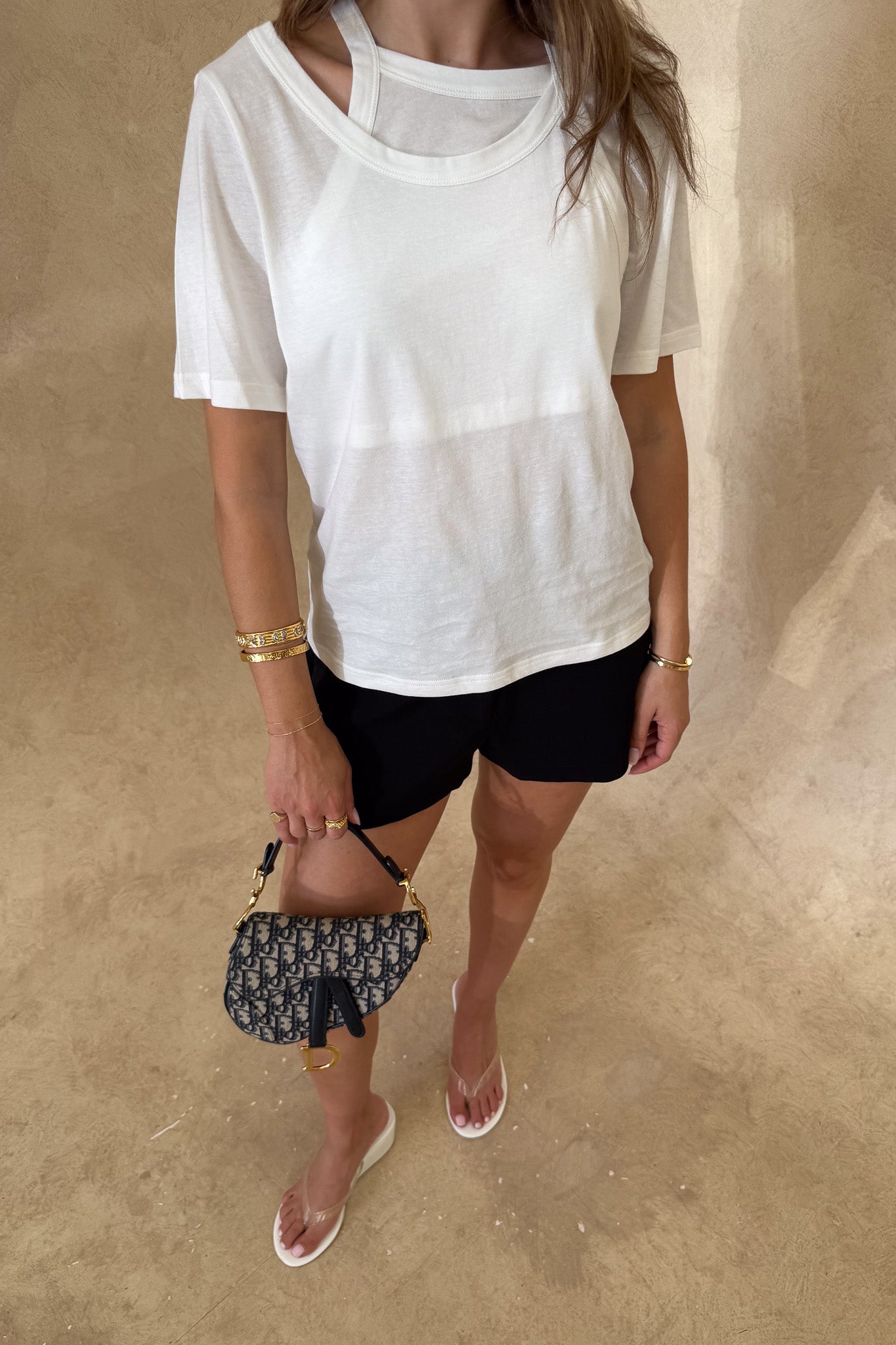 Layered Tee in White by Sneaky Link, 100% cotton with a relaxed fit and layered neckline detail. Perfect for elevated casual dressing.
