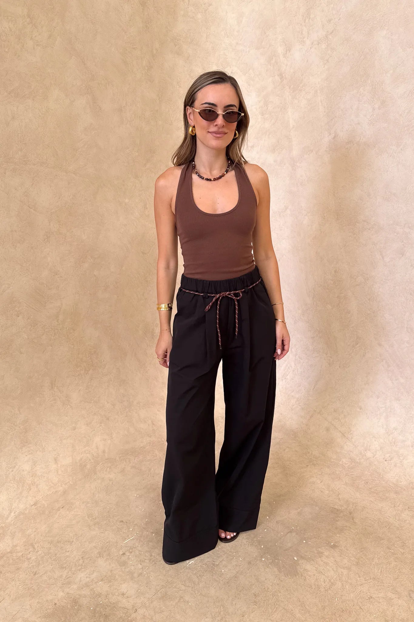 Jaz Hand Halter Tank Chocolate by Sneaky Link, a sculpted halter silhouette with stretch cotton fit. Perfect for everyday summer layering.
