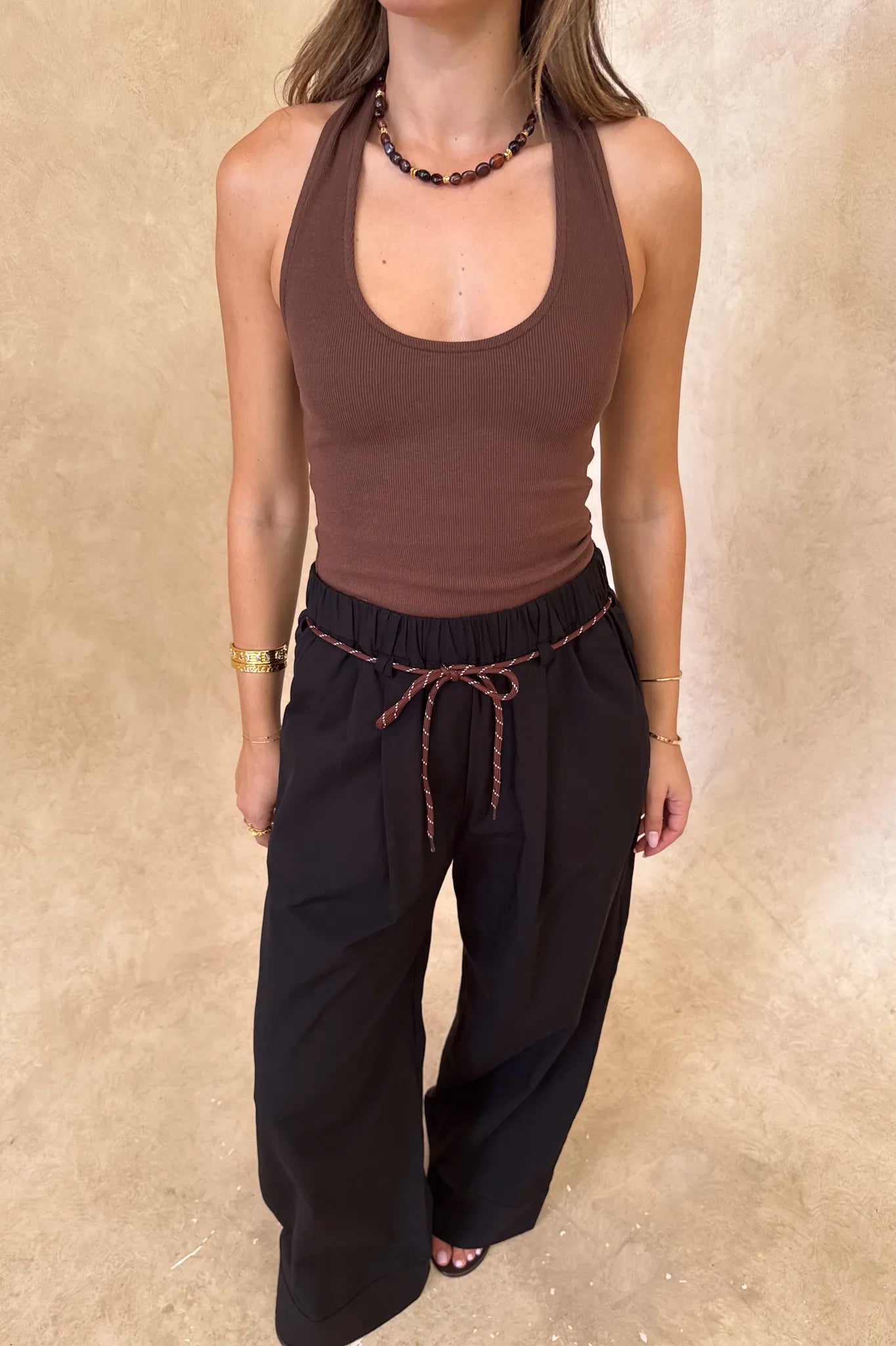 Jaz Hand Halter Tank Chocolate by Sneaky Link, a sculpted halter silhouette with stretch cotton fit. Perfect for everyday summer layering.
