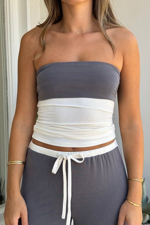 Hunter Tube Top Steel/Ivory by Sneaky Link – Sleek strapless top with contrast neckline and ruched sides. Perfect for trendy coordinated looks and viral summer vibes.