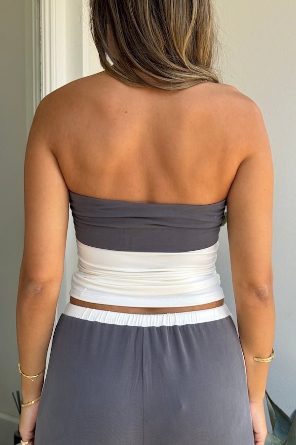 Hunter Tube Top Steel/Ivory by Sneaky Link – Sleek strapless top with contrast neckline and ruched sides. Perfect for trendy coordinated looks and viral summer vibes.