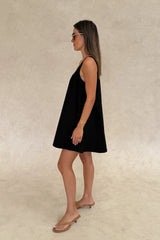 Boston Mini Dress Black by Sneaky Link – a lightweight cotton poplin mini with easy fit. Perfect for effortless summer styling.