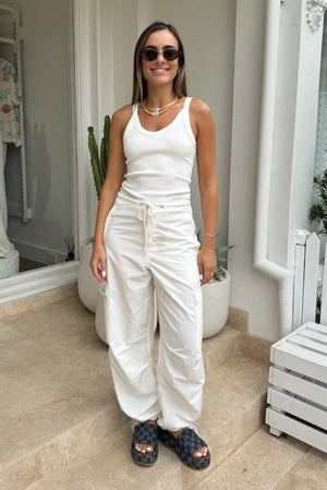 Cargo Link Pants White by Sneaky Link, versatile low-rise cargo pants with adjustable waist and hem ties for a laid-back or cuffed streetwear look.