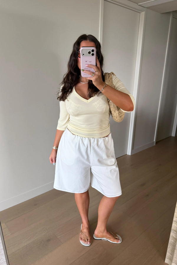 Jaz Mid Rise Bermuda Short Ivory by Sneaky Link, tailored bermuda shorts with mid rise fit, perfect for chic everyday styling