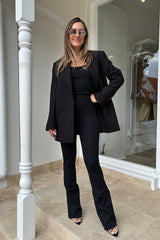 Neoprene Flared Leggings by Commando, high-rise flared neoprene pants with smoothing waistband and light compression, perfect for sleek, flattering everyday style.