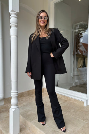 Neoprene Flared Leggings by Commando, high-rise flared neoprene pants with smoothing waistband and light compression, perfect for sleek, flattering everyday style.