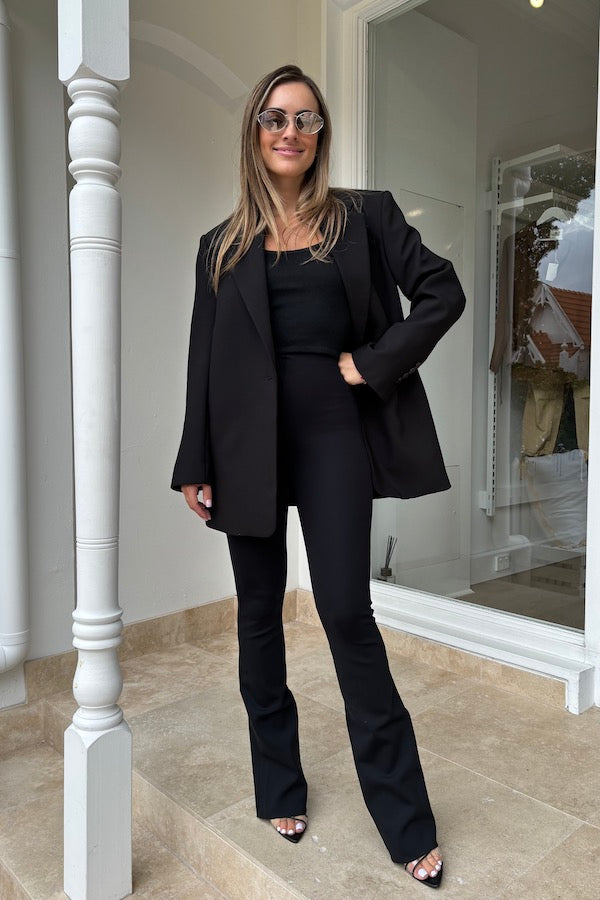 Neoprene Flared Leggings by Commando, high-rise flared neoprene pants with smoothing waistband and light compression, perfect for sleek, flattering everyday style.