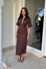 Lefka Midi Dress in Chocolate by Sneaky Link, linen midi with cinched waist, ruched tummy, and exaggerated sleeves.