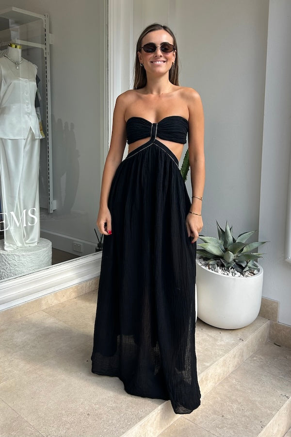 Chloe Dress Black by D'Artemide – A one-size cotton dress with ruched strapless top, side split, and relaxed low-back finish.