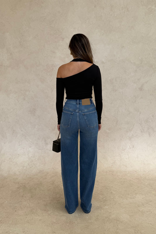 Celine High Rise Stretch Jean Indigo by Sneaky Link, high-stretch sculpting denim with a clean flare, elongating legs perfectly.