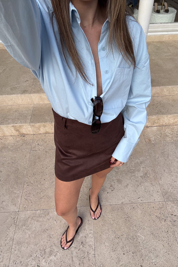 Dani Mini Skirt Chocolate by Sneaky Link, luxe faux suede A-line skirt with crossed belt loop detailing, perfect for co-ords or layering.