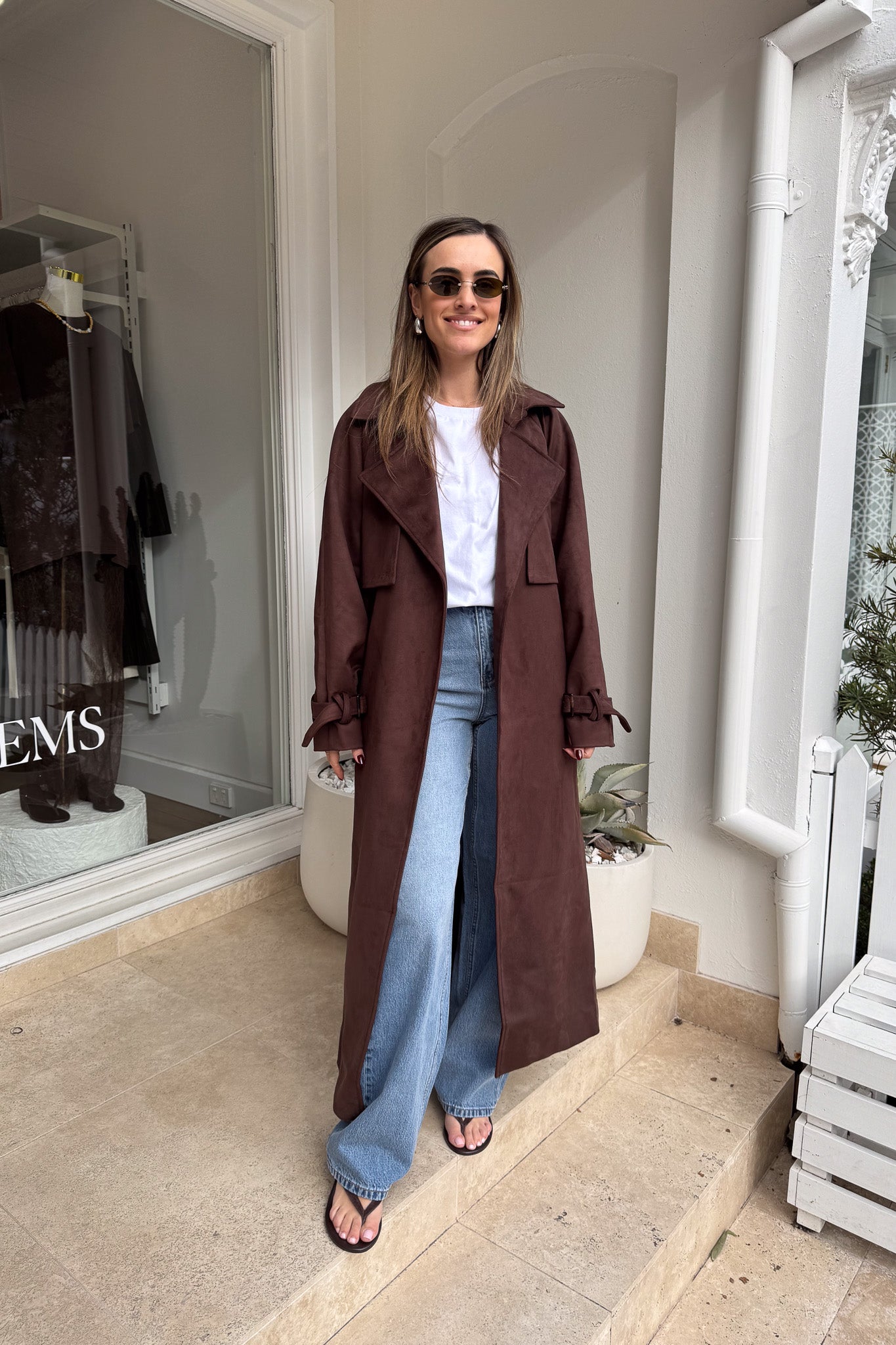 Dani Trench Coat Chocolate by Sneaky Link, modern classic faux suede trench with structured lapels and waist-defining belt, perfect for layering and transitional seasons.