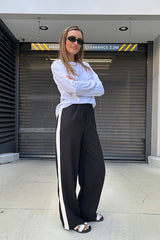 Long Sleeve Tee White by Sneaky Link – The ultimate capsule piece, this loose-fit 100% cotton tee is perfect for everyday wear. Lia wears M, Renee wears XS.