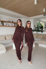 Caterina Midi Dress Chocolate by Sneaky Link – A sexy, cozy modal blend midi with ruched skirt and boat neckline, perfect for chic evening events and cooler nights.