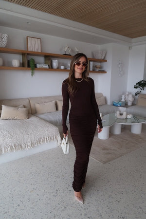Caterina Midi Dress Chocolate by Sneaky Link – A sexy, cozy modal blend midi with ruched skirt and boat neckline, perfect for chic evening events and cooler nights.
