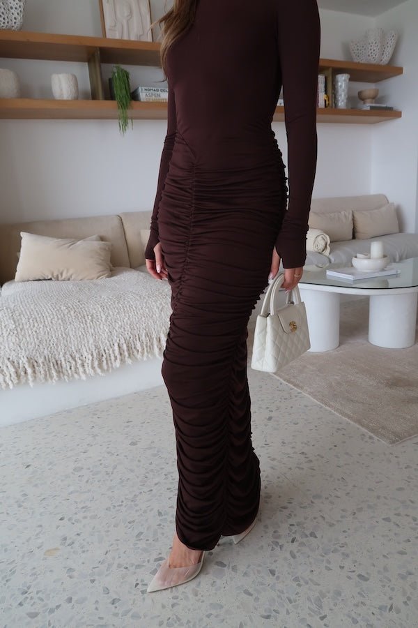 Caterina Midi Dress Chocolate by Sneaky Link – A sexy, cozy modal blend midi with ruched skirt and boat neckline, perfect for chic evening events and cooler nights.
