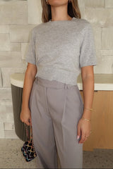 Niamh Knit Top Grey by Sneaky Link – Cropped knit tee with high scoop neck and ribbed details. Perfect for chic office looks or viral casual wear.