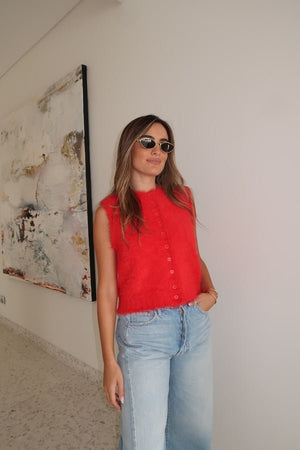 Kai Vest Red by Sneaky Link – Cozy, chic sleeveless vest in soft fluffy yarn. Perfect for layering over long sleeves or under a trench for effortless style.