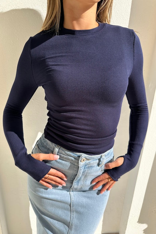 The Brooklyn Top Navy by Mossman, lightweight knitwear with a high round neckline and thumb sleeve openings, perfect for trendy layering and casual chic looks.
