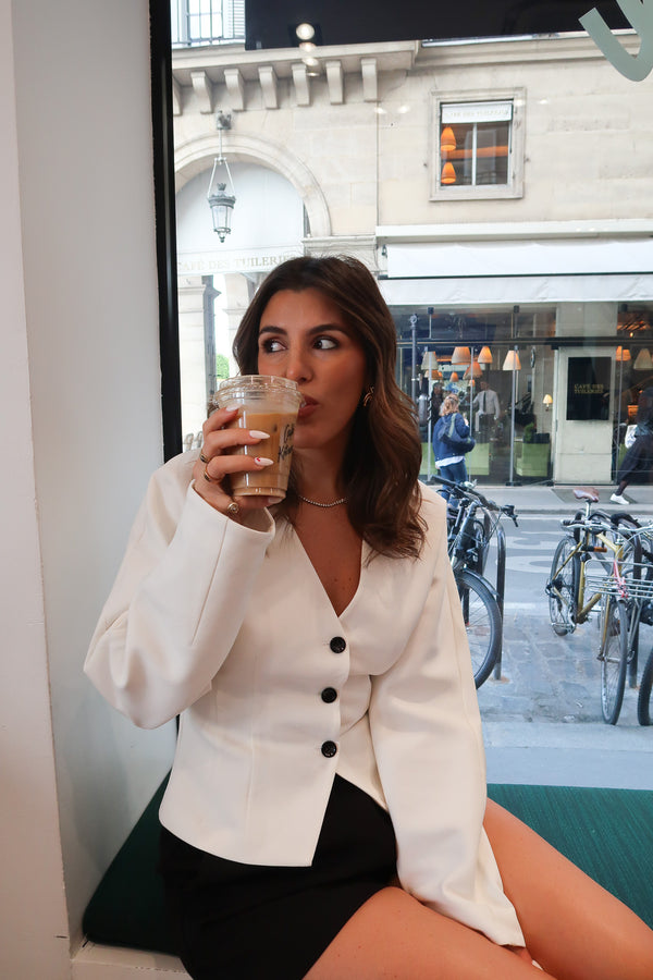 Sophia Long Sleeve Top White by Sneaky Link, chic cropped fit with black buttons, perfect for styling with denim or tailored pants.