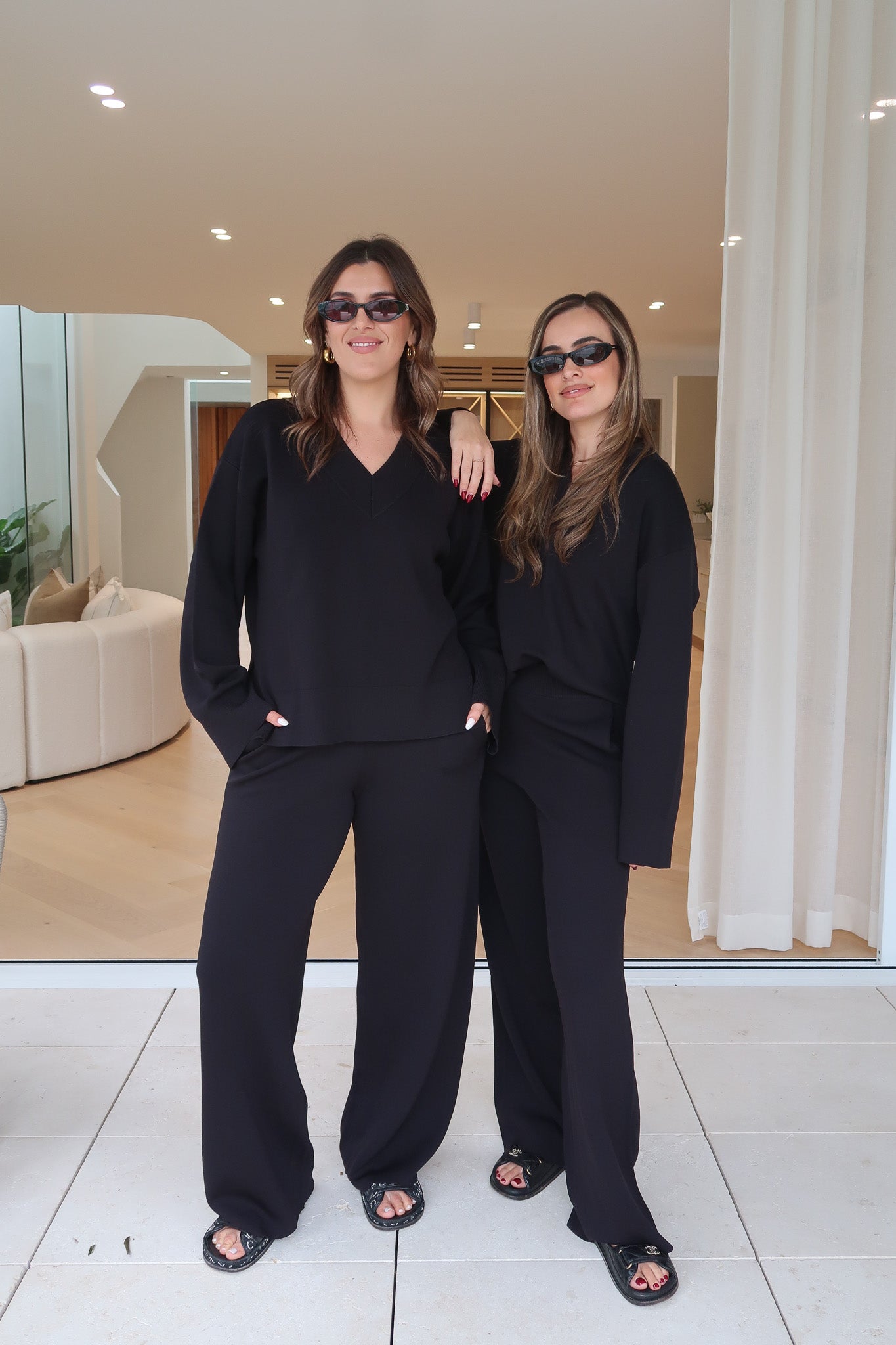 Sneaky Link Lilly Sweater in luxe viscose yarn, an oversized V-neck knit with ribbed trims, perfect for off-duty layering and comfort.