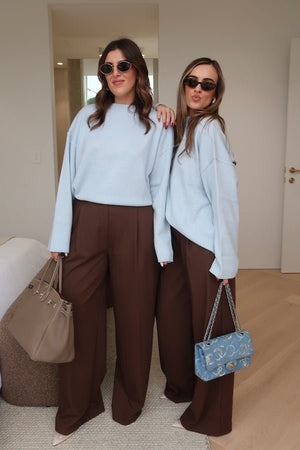 Pia Knit Sweater Blue by Sneaky Link — Soft, cozy wool blend with ribbed neckline, rolled cuffs, and oversized fit. Perfect for layering on cooler days.