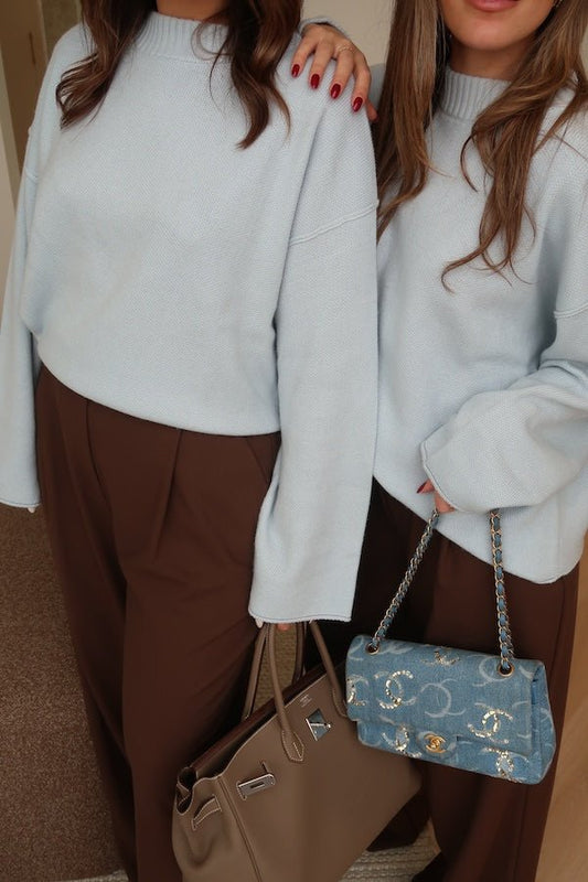 Pia Knit Sweater Blue by Sneaky Link — Soft, cozy wool blend with ribbed neckline, rolled cuffs, and oversized fit. Perfect for layering on cooler days.