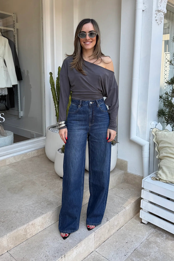 Dee Top by Sneaky Link, off-shoulder top in a soft viscose blend with dolman sleeves and gathered waist for an effortlessly chic look.