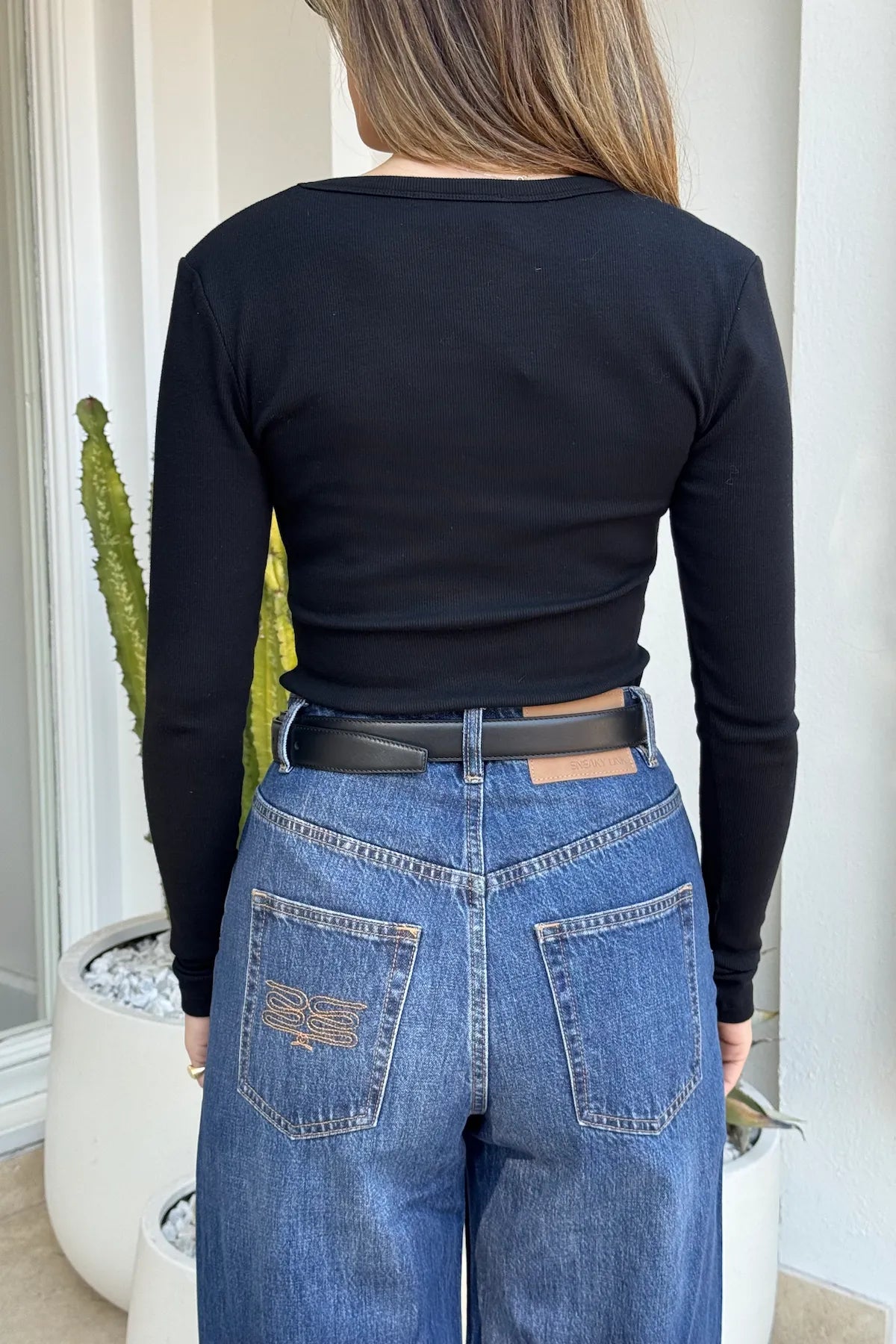 Christina Long Sleeve Top by Sneaky Link, fitted V-neck long sleeve in soft, stretchy cotton rib—perfect for layering or wearing solo.