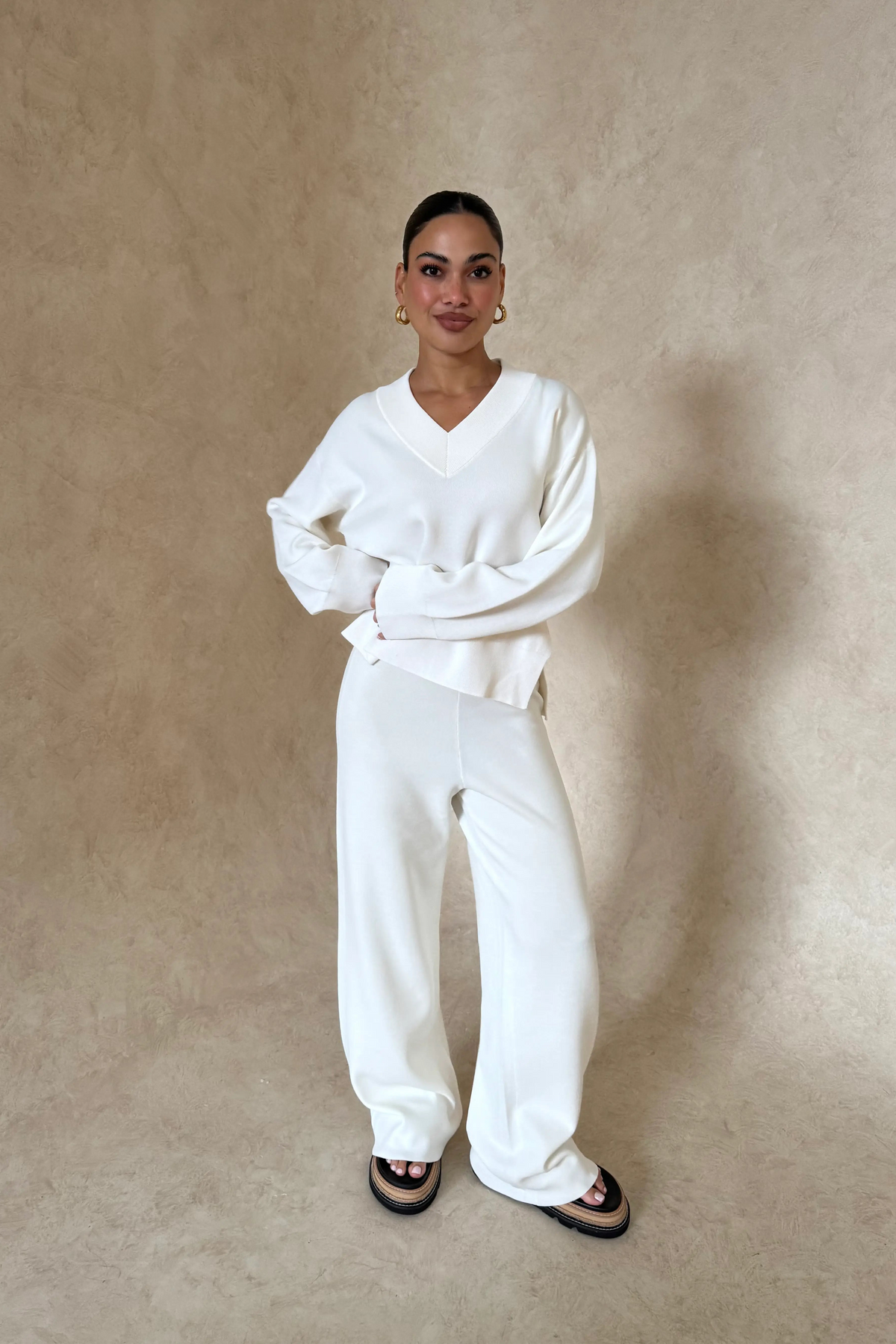 Lilly Sweater by Sneaky Link, oversized boxy viscose blend sweater with V-neck, ribbed hems and cuffs for effortless layering.