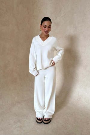 Lilly Sweater by Sneaky Link, oversized boxy viscose blend sweater with V-neck, ribbed hems and cuffs for effortless layering.