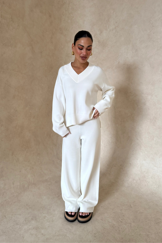 Lilly Sweater by Sneaky Link, oversized boxy viscose blend sweater with V-neck, ribbed hems and cuffs for effortless layering.