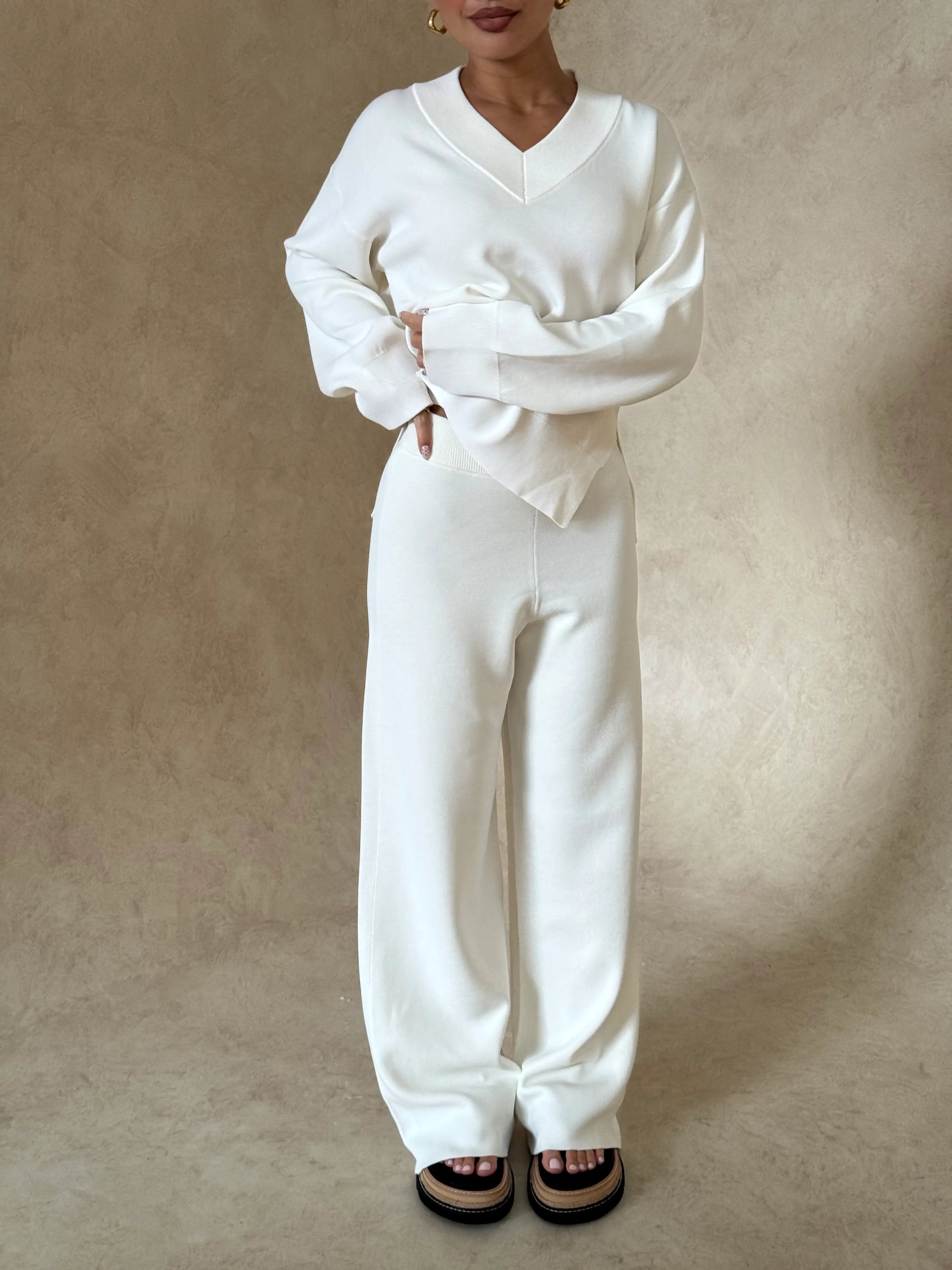 Lilly Sweater by Sneaky Link, oversized boxy viscose blend sweater with V-neck, ribbed hems and cuffs for effortless layering.