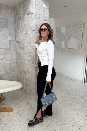 Cooper Long Sleeve Top White by Sneaky Link – Soft cotton-spandex blend with high scoop neckline and off-centre snaps. Perfect for viral layering and everyday chic.