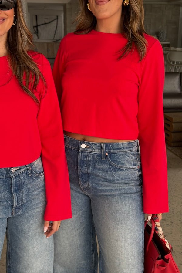 Claudia Long Sleeve Top Red by Sneaky Link – Soft cotton blend cropped tee with relaxed fit and long sleeves. Perfect for cozy autumn vibes and viral casual looks.