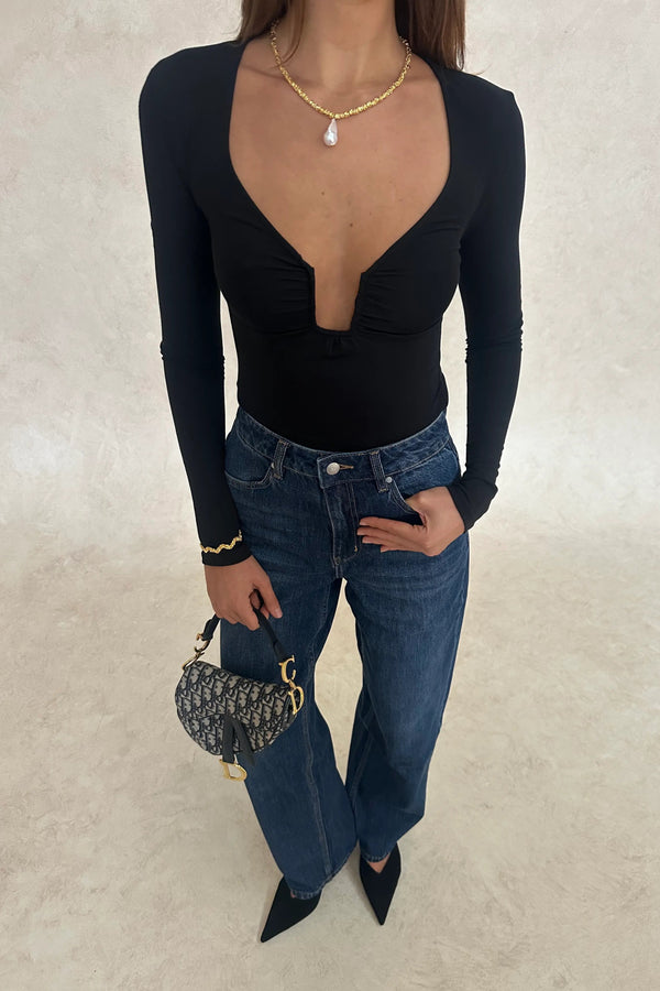 Haley Long Sleeve Top Black by Sneaky Link. Soft modal blend with long sleeves, low neckline, and structured front. Perfect for night outs.