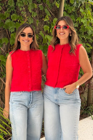 Kai Vest Red by Sneaky Link – Cozy, chic sleeveless vest in soft fluffy yarn. Perfect for layering over long sleeves or under a trench for effortless style.