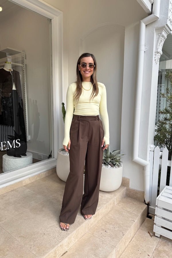 Brooklyn Top Yellow by Mossman – Trendy lightweight knit with high round neck, thumb holes, and longline fit. Perfect for layering and casual chic days.