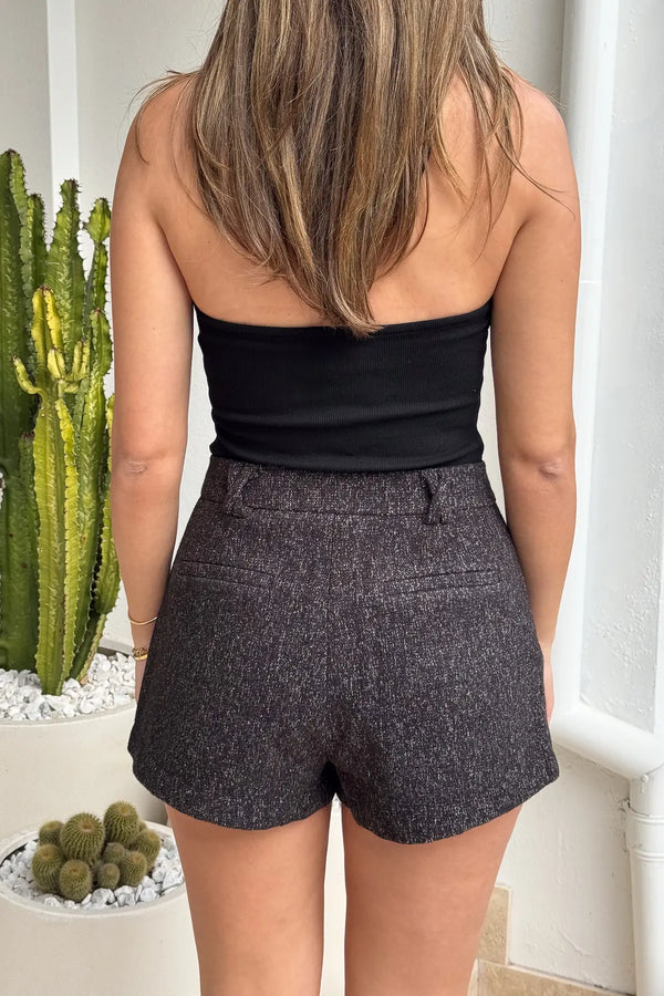 Gretta Short Black Marle by Sneaky Link, tailored mini with subtle A-line, textured poly fabric, perfect with matching blazer for polished layering.